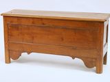 a small wooden chest on a white background
