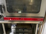 an image of a stainless steel oven in a kitchen