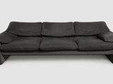 an image of a black couch on a white background