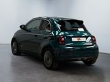 a small car that is parked in a room