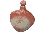a red and white vase on a white background