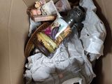 a cardboard box with a lot of stuff inside of it