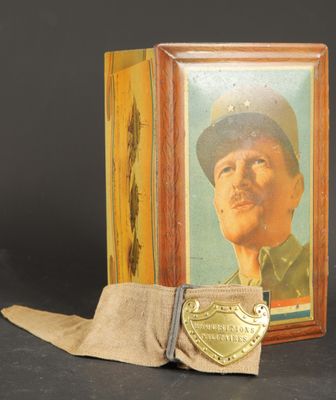 an old picture of a man in a military uniform with a hat on