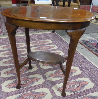 a wooden table with a shelf on it in the middle of a room