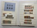 a book with stamps on the pages and a book with stamps on the pages