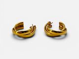 two pairs of gold hoop earrings on a white background