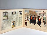 an open book with a picture of a group of people on it