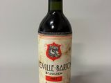a bottle of wine that is sitting on a table