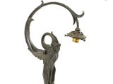 bronze sculpture of a woman holding a lamp on a white background