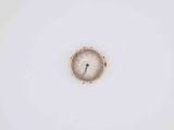 a clock that is on the side of a white wall