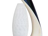 a lamp that is sitting on a table next to a lamp