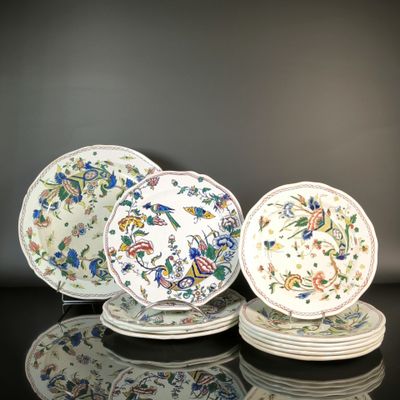 several plates are stacked on top of each other on a table