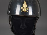 an image of a helmet on a mannequin head with a gold emblem on it