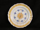 an image of a plate with yellow and blue designs on it
