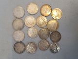 a lot of coins that are sitting on a table