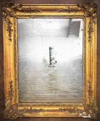 a picture of a reflection of a boat in the water