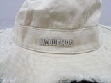 a close up of a hat with a tag on it