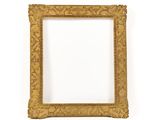 a gold picture frame on a white wall with a white background