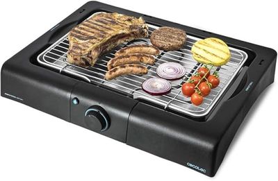 une image représentant un barbecue avec de la viande et des légumes dessus