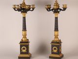pair of antique black and gold candlesticks