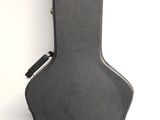 an image of a guitar case sitting on top of a table