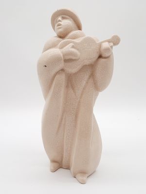 figurine of a man in a hat and robe holding a baseball bat