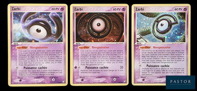 three cards with different designs of eyes on them on a black background