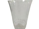a glass vase that is sitting on a table