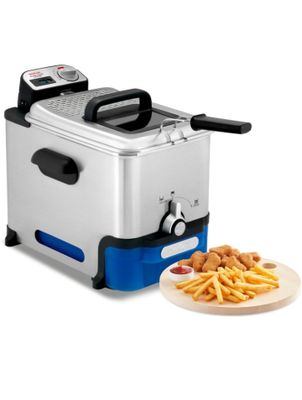 an electric deep fryer with french fries on a plate next to it