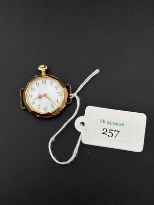 a close up of a watch with a price tag attached to it