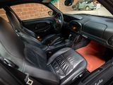 a picture of the interior of a car with leather seats