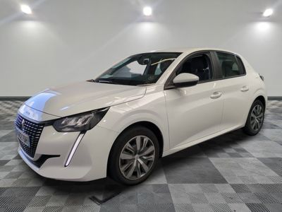 a white car parked on a checkered tile floor in a room