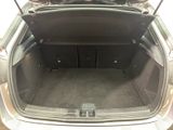 a trunk of a car with luggage in it