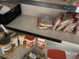 many food items on the shelves in the store