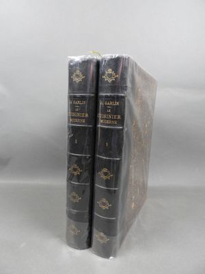 the two books are wrapped in plastic and ready to be used