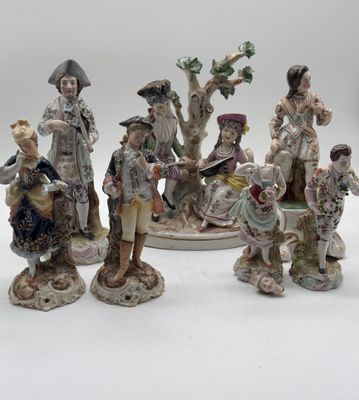 many figurines that are sitting on a table
