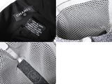 two pictures of a black and white bag with a label on it