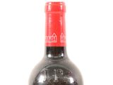 a bottle of wine that is sitting on a table