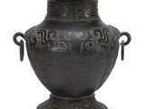 a black vase with handles on a white background