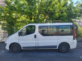 a white van that is parked in a parking lot