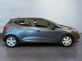 a picture of a grey car in a showroom