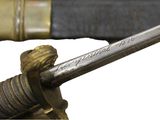 a close up of a sword with a sword handle
