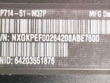 the back of a laptop with a bar code on it