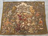 an image of a tapestry with a picture of a man riding a horse