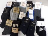 several pairs of men ' s socks are on a white surface