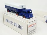 a toy truck that is sitting on top of a box
