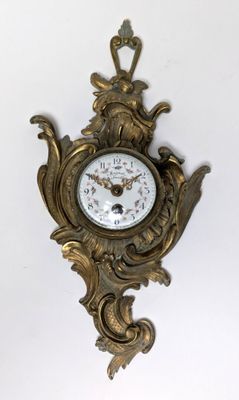 a clock that is hanging on the wall in the room