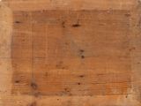 a piece of wood that has been cut and is laying on the ground