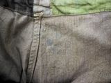 a close up of a pair of jeans with a patch on the back
