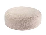Le panier rond pour chien est fabriqué dans une matière douce et moelleuse.